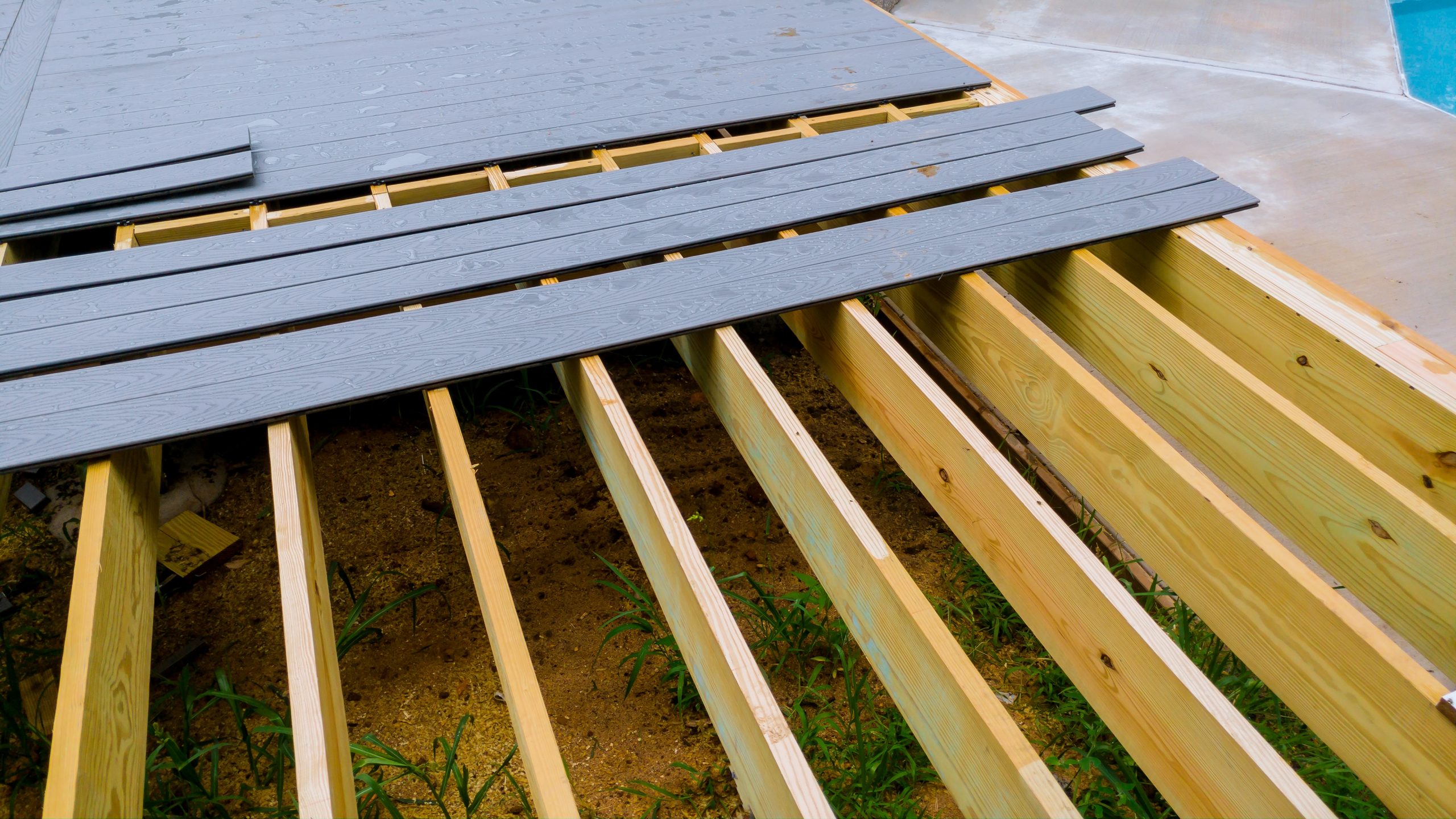 Composite backyard deck construction